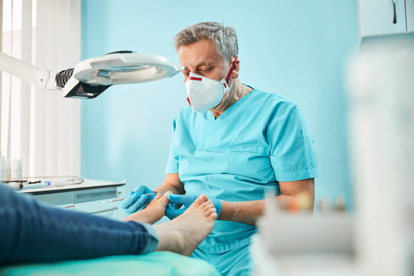 Podiatrists' Views: Why They Recommend the Combined Use of Orthotic Insoles and Massage Balls